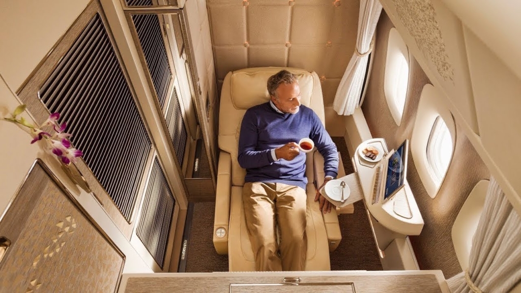 Business Class Travels Luxury Seats recliner man eating